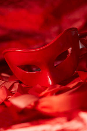 red mask and red ribbonsの写真素材