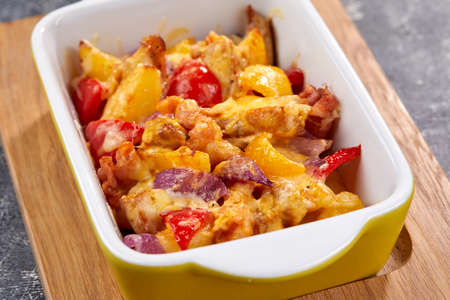 roasted vegetables with meat and cheeseの写真素材