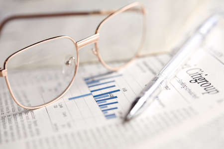 eyeglasses on the newspaper pagesの写真素材