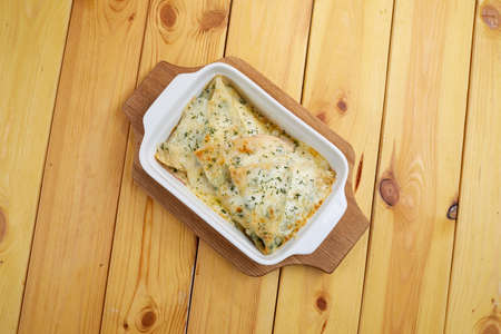 Pancakes with roasted mushrooms, cheese and vegetablesの写真素材