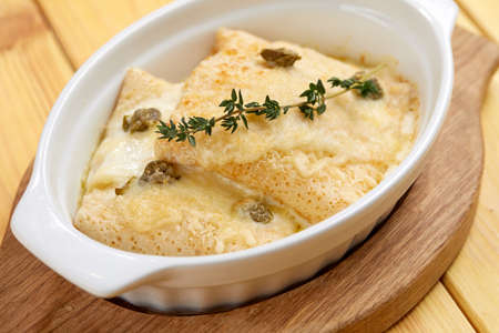 Pancakes with roasted mushrooms, cheese and vegetablesの写真素材