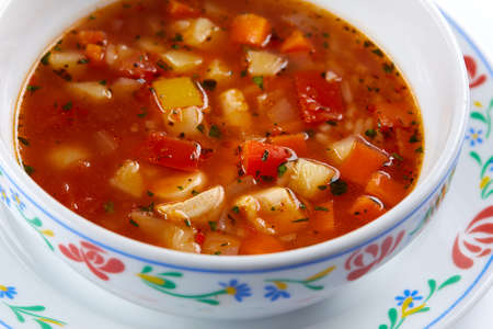 Italian soup on the white backgroundの写真素材