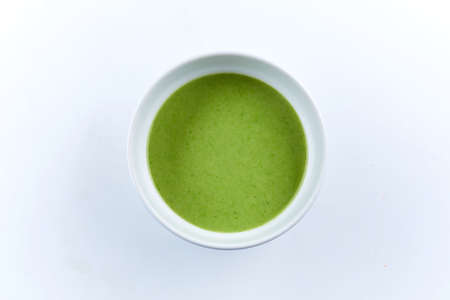 green cream soup with broccoliの写真素材