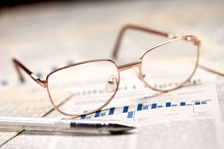 eyeglasses on the newspaper pagesの写真素材