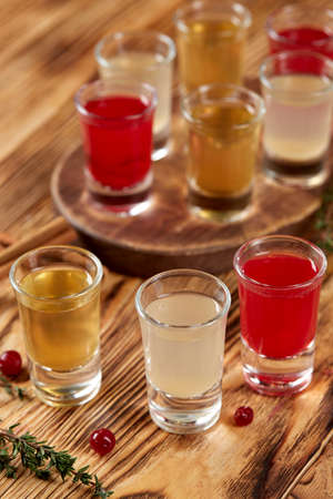 berry shots on the wooden backgroundの写真素材