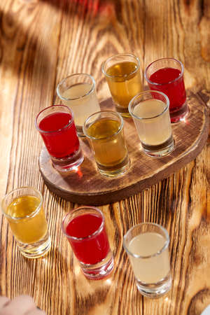 berry shots on the wooden backgroundの写真素材