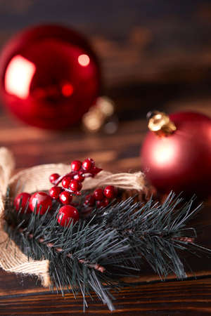 pine branch with berries and conesの写真素材