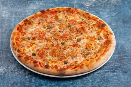 pizza on the wooden backgroundの写真素材