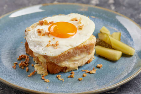 breakfast with fried egg and cheeseの写真素材