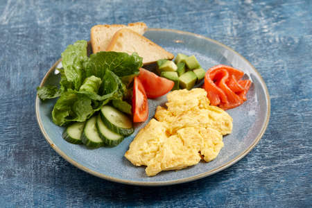 omelet with fresh vegetables and salmonの写真素材