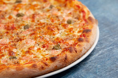 pizza on the wooden backgroundの写真素材