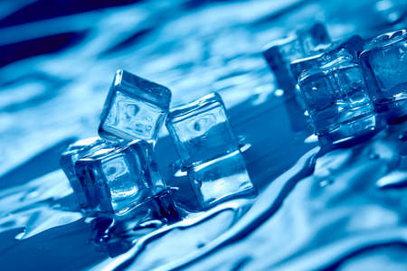 ice cubes on the blue backgroundの写真素材