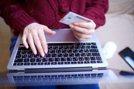Online shopping concept, woman with credit cardの写真素材