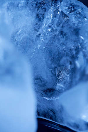 ice cubes on the blue backgroundの写真素材
