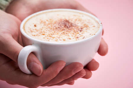 woman with cup of cappuccinoの写真素材