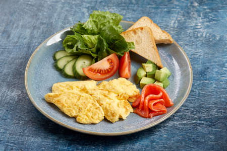 omelet with fresh vegetables and salmonの写真素材