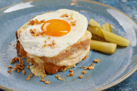 breakfast with fried egg and cheeseの写真素材