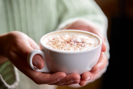 woman with cup of cappuccinoの写真素材