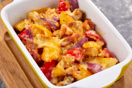 roasted vegetables with meat and cheeseの写真素材