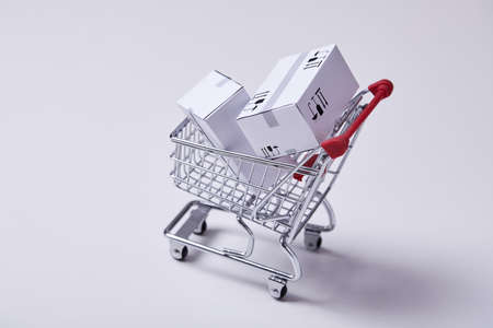 shopping trolley with boxesの写真素材