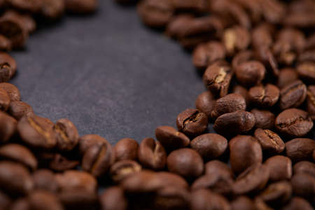 coffee beans on the wooden backgroundの写真素材