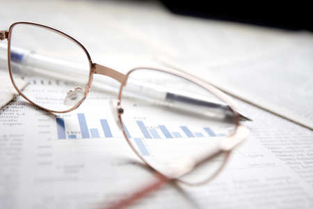 eyeglasses on the newspaper pagesの写真素材