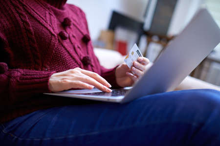 Online shopping concept, woman with credit cardの写真素材