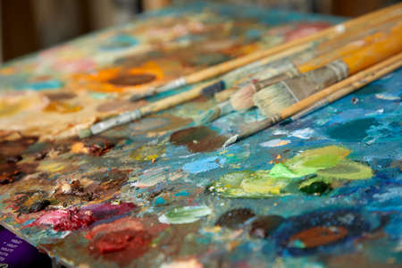 Tubes of oil paint and artist paint brushesの写真素材