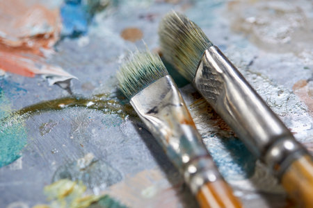 Tubes of oil paint and artist paint brushesの写真素材