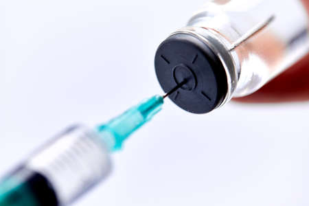 Vaccine in vial with syringeの写真素材