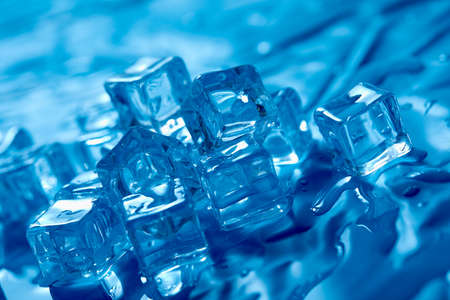ice cube on the blue backgroundの写真素材