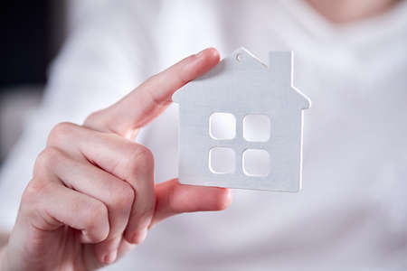Hand Holding White Icon Houseの写真素材