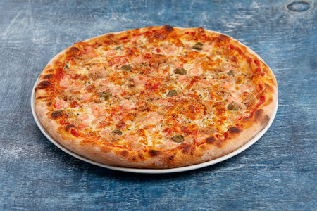 pizza on the wooden backgroundの写真素材