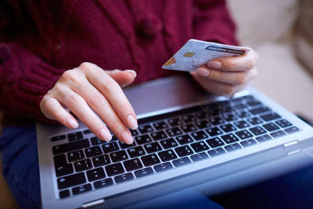 Online shopping concept, woman with credit cardの写真素材