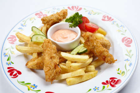 Chicken nuggets with french friesの写真素材