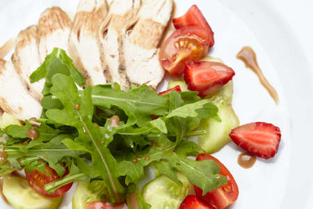 chicken fillet with salad and sauceの写真素材