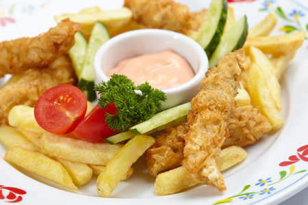 Chicken nuggets with french friesの写真素材