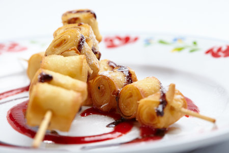 fried sweet rolls with sauceの写真素材