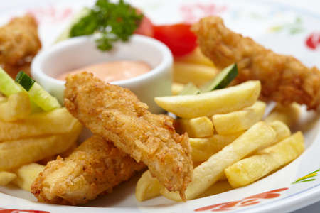 Chicken nuggets with french friesの写真素材