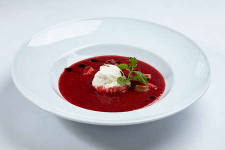 strawberry soup with ice creamの写真素材
