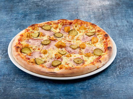 Italian pizza on the white plateの写真素材
