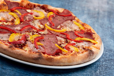 Italian pizza on the white plateの写真素材