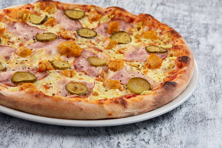Italian pizza on the white plateの写真素材
