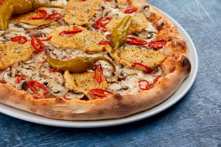 Italian pizza on the white plateの写真素材