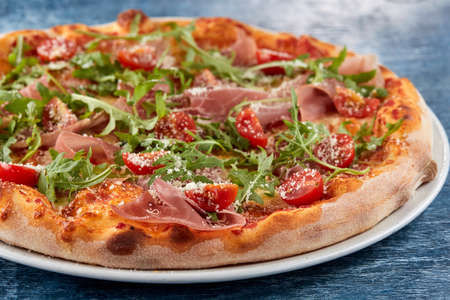 Italian pizza on the white plateの写真素材