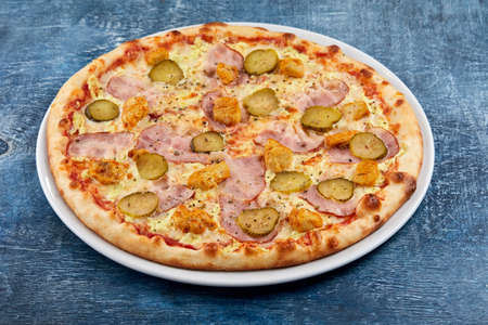 Italian pizza on the white plateの写真素材