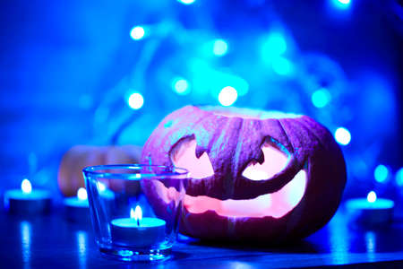 Halloween pumpkin and candlesの写真素材