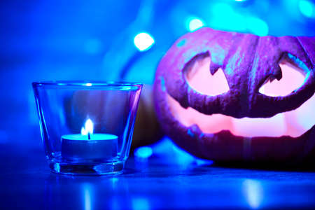 Halloween pumpkin and candlesの写真素材