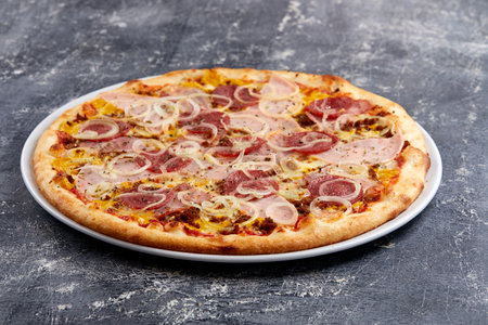 tasty italian pizza on wooden backgroundの写真素材