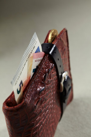 wallet with money on tableの写真素材